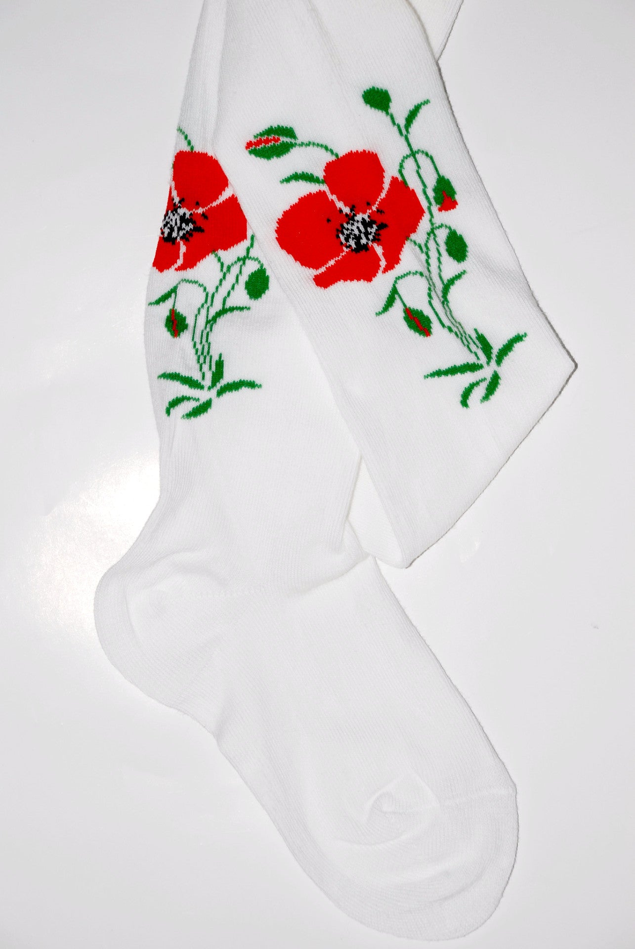 Girl's dress tights with Poppy flower design. White.