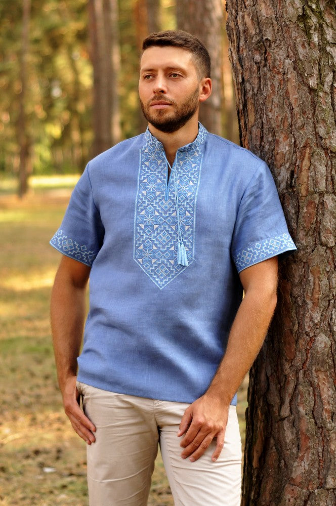 Men's short sleeve Vyshyvanka with beige embroidery. Blue