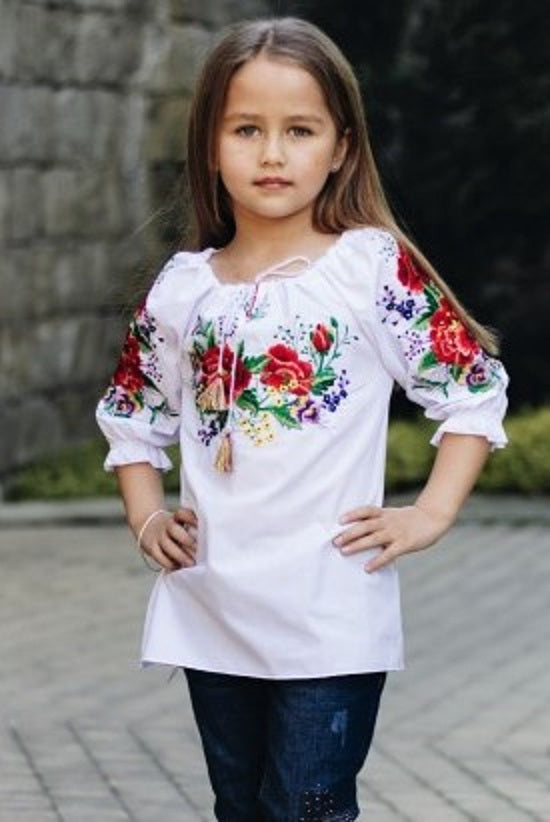 Girl's blouse with floral embroidery