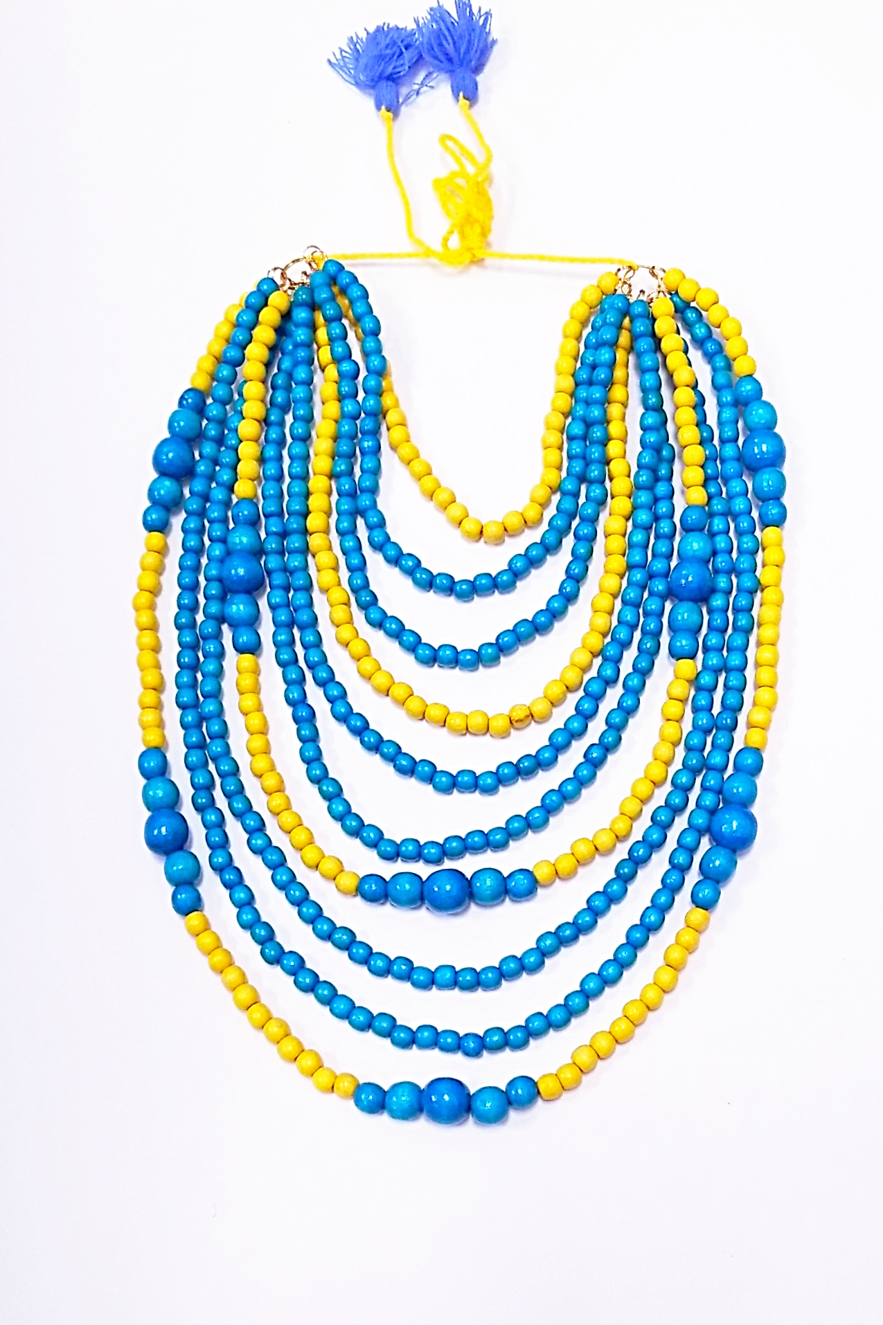 Artisan crafted wooden bead 10-strand necklace. Blue and yellow